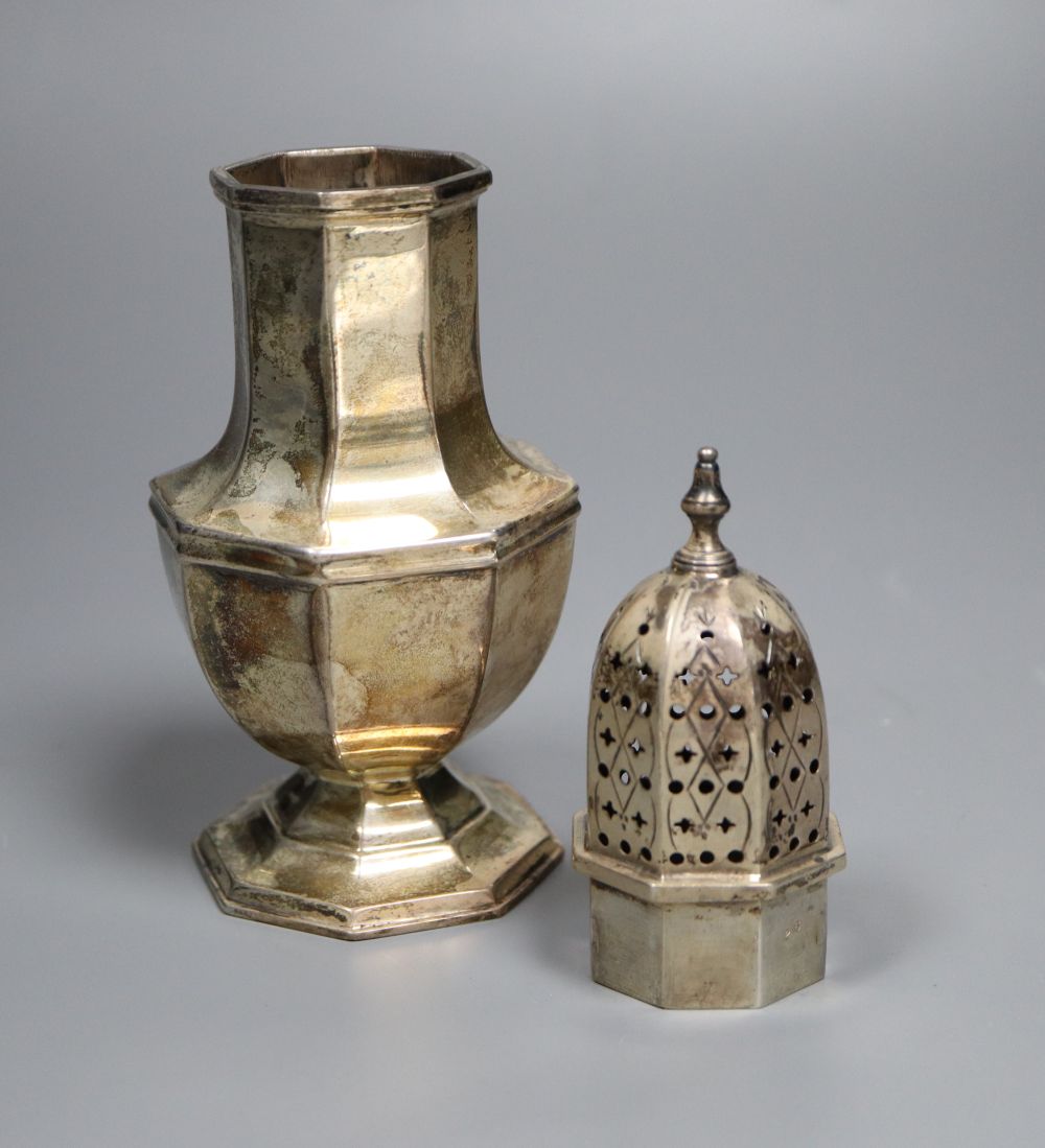 A 1930s silver octagonal sugar caster, 18cm, 5.5oz.